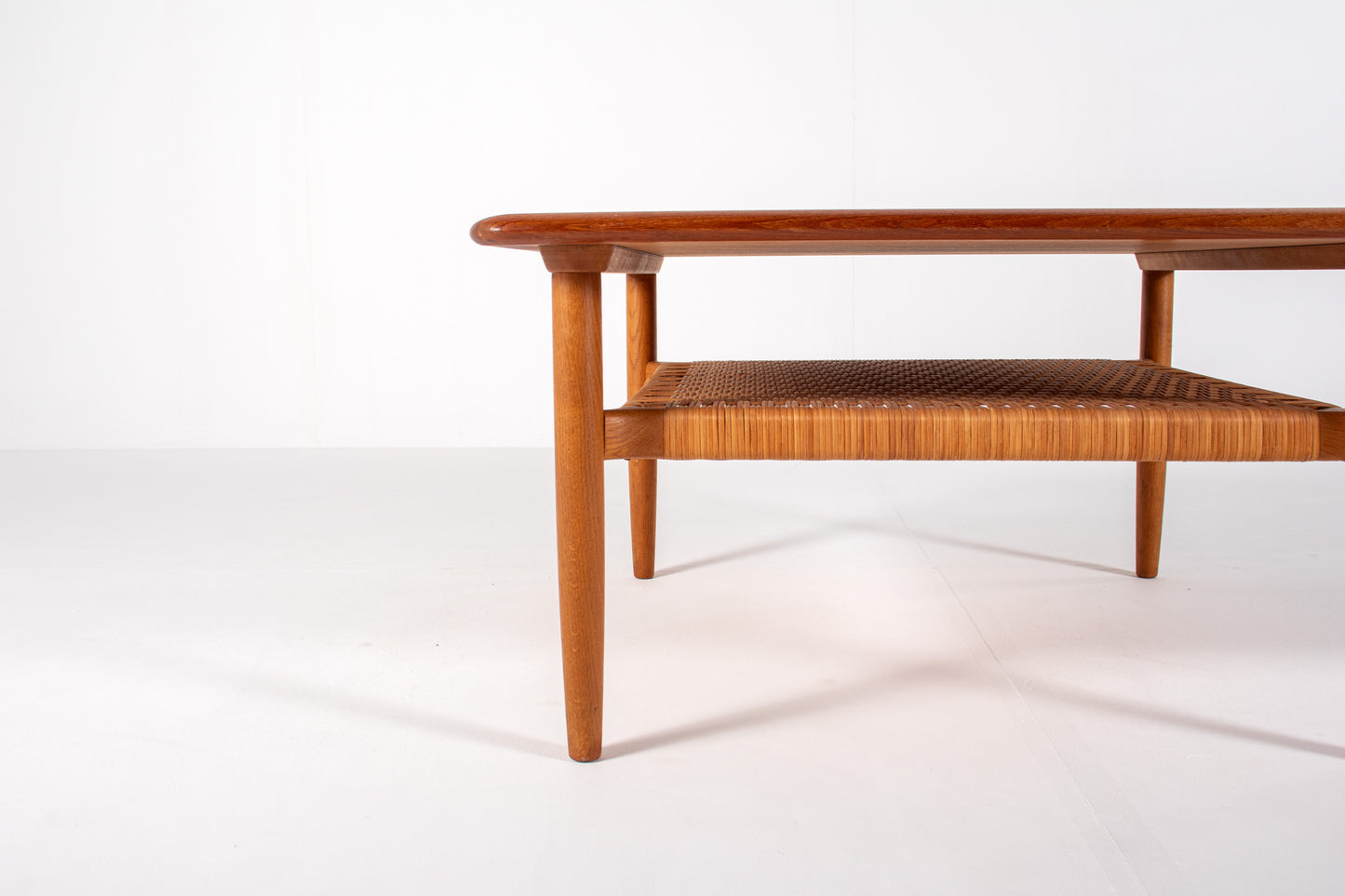 Detail of rounded teak edges on Danish coffee table