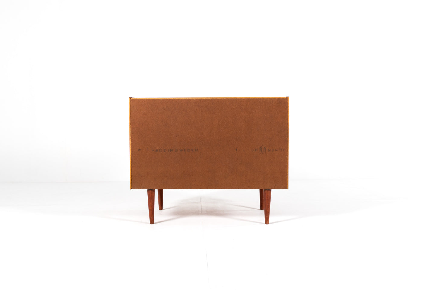 Mid century modern teak furniture back view