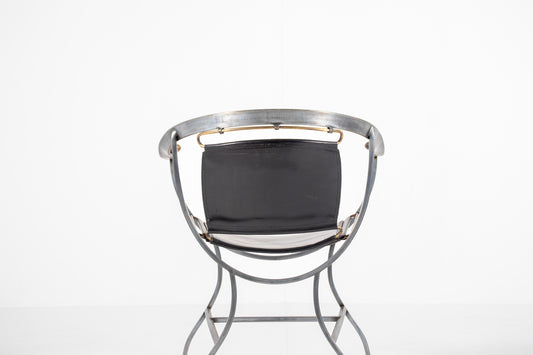A mid-century modern metal chair Alberto Orlandi Pompei in Steel, Bronze and Black Leather