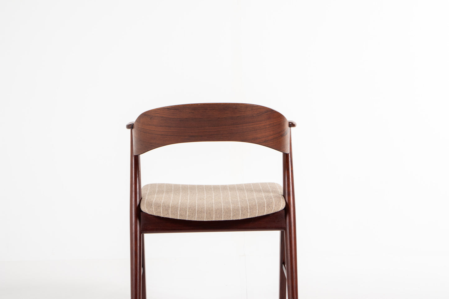 Rosewood grain and joinery detail on Korup Stolefabrik dining chair
