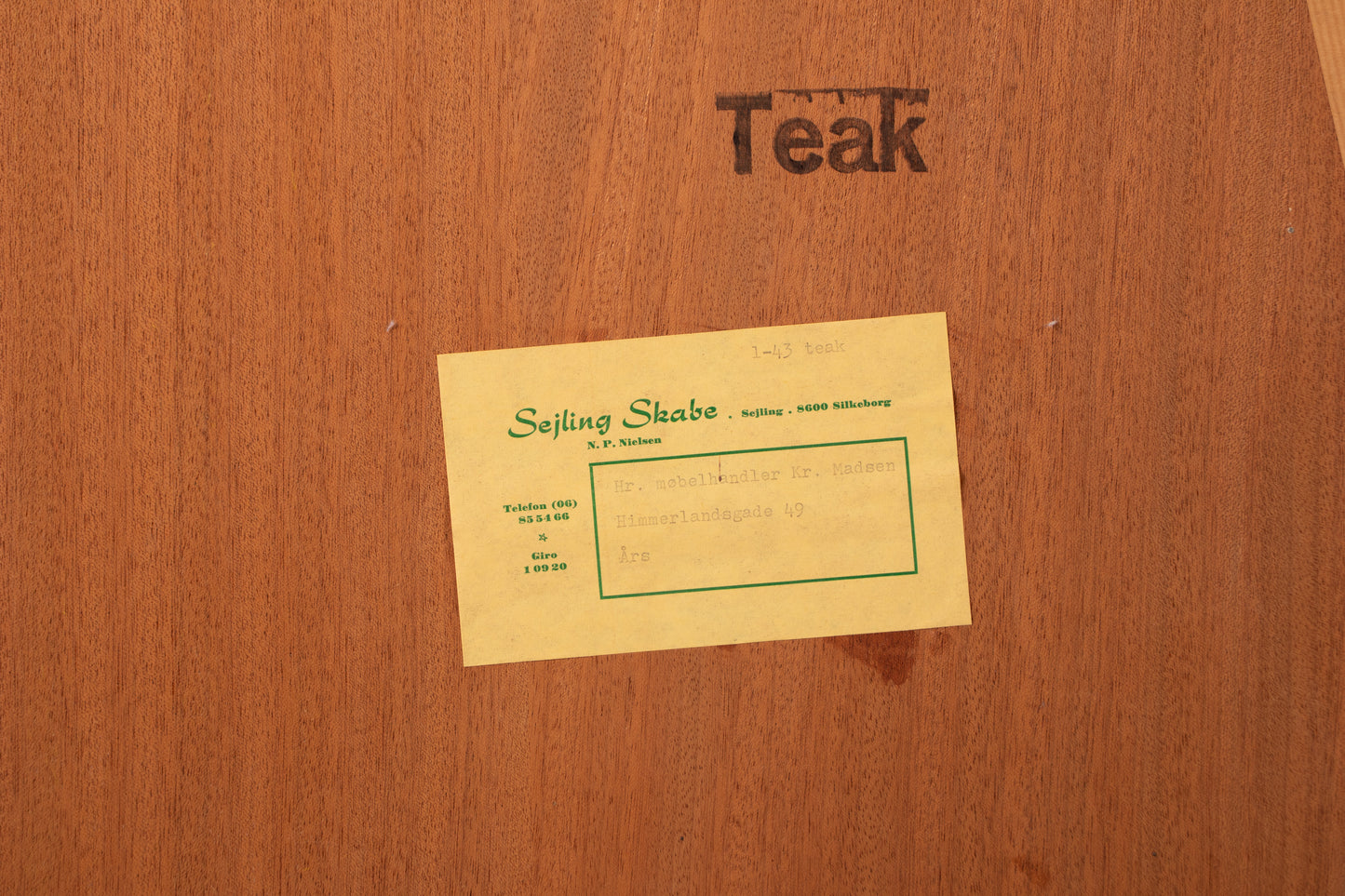 Original Sejling Skabe label and teak stamp on back of Danish bookcase