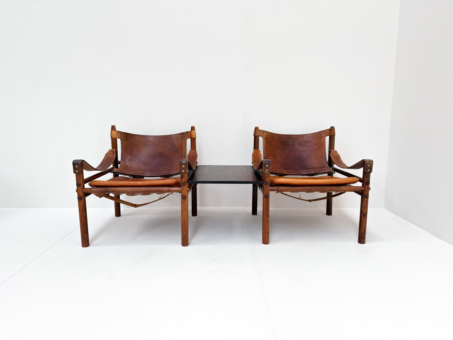 Pair of Arne Norell Sirocco safari chairs cognac leather Sweden 1960s