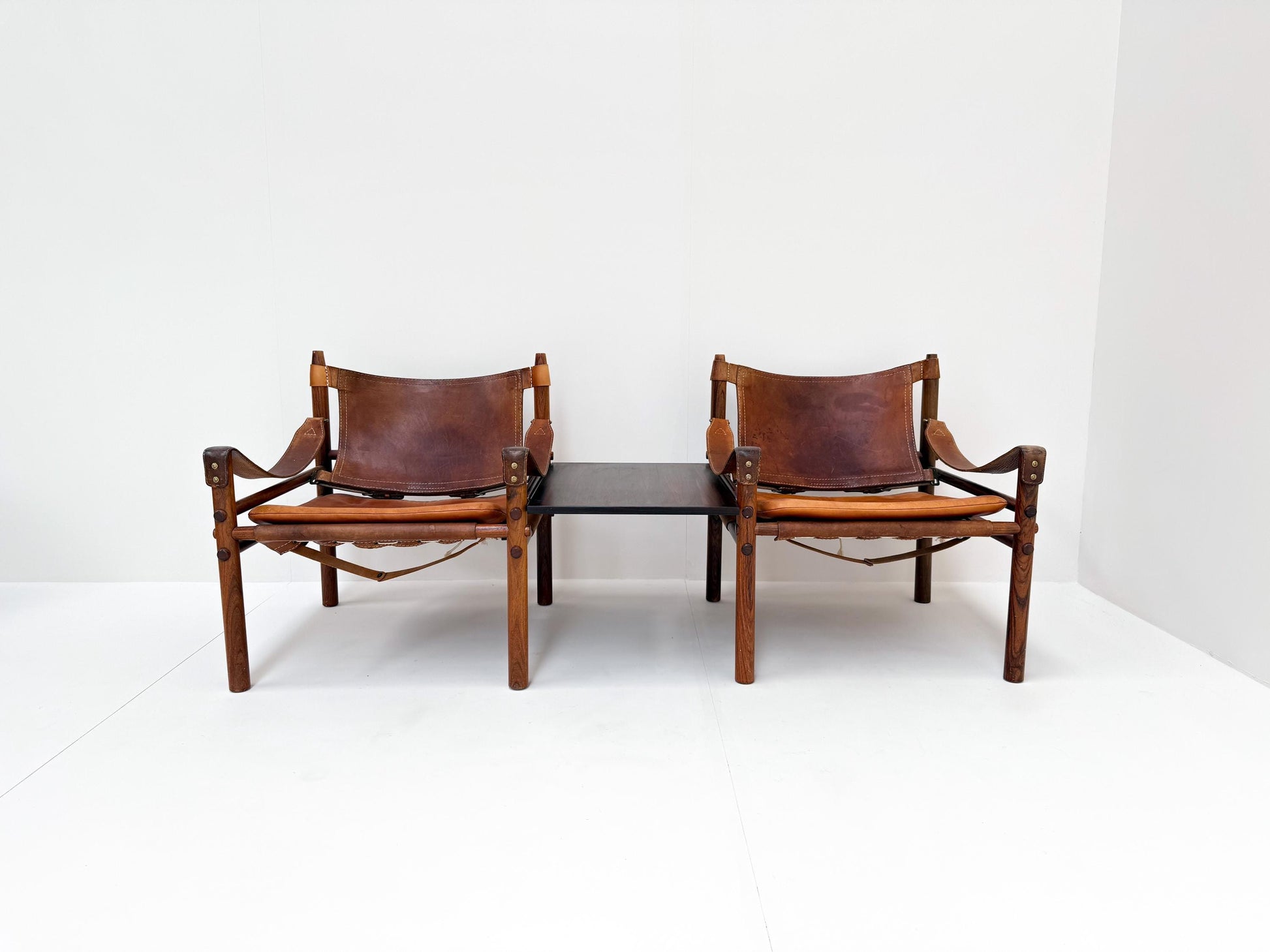 Pair of Arne Norell Sirocco safari chairs cognac leather Sweden 1960s