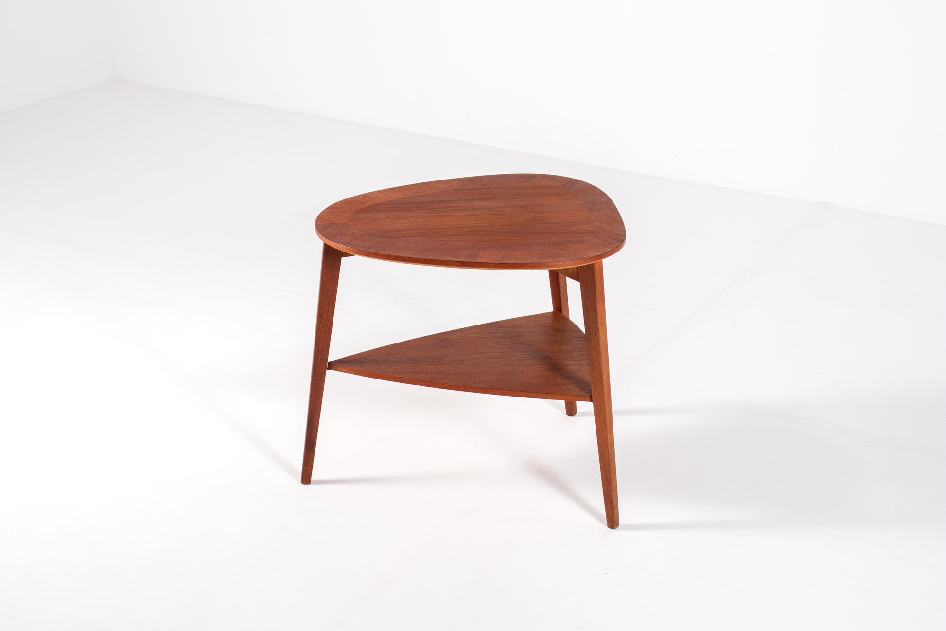 Teak side table with triangular top by Møbelintarsia