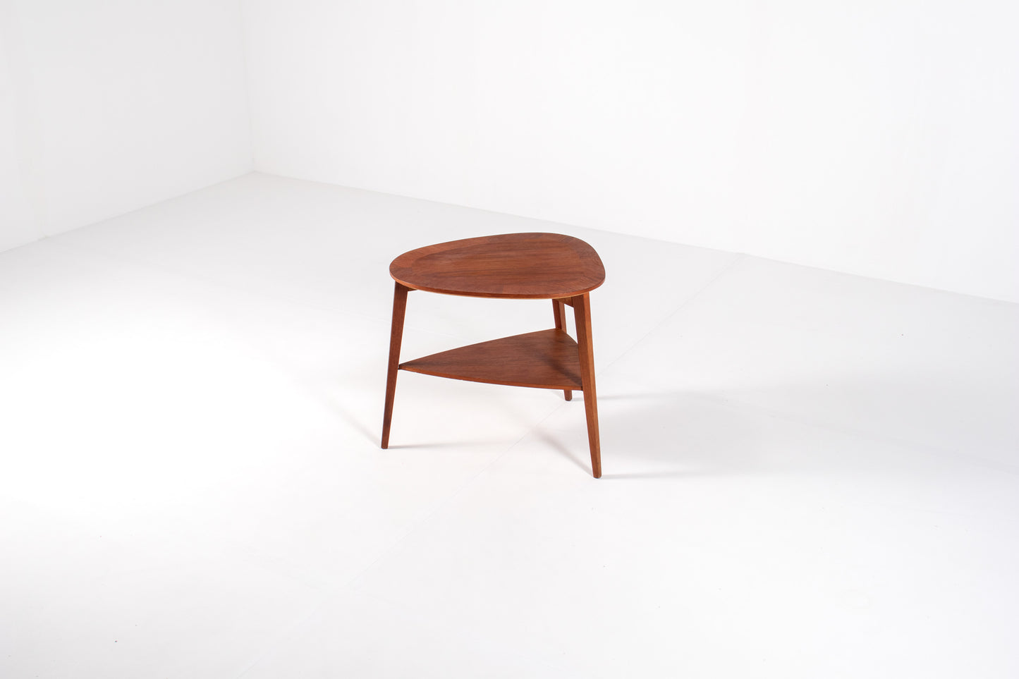 Teak side table with triangular top by Møbelintarsia