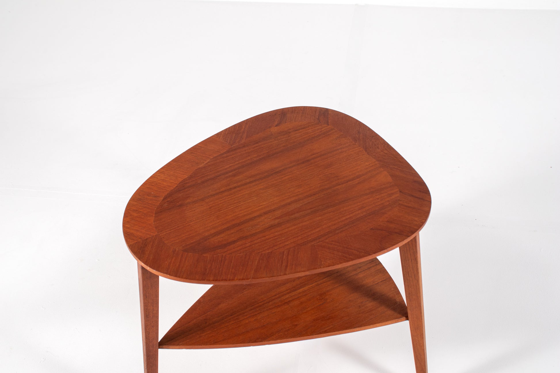 Teak side table with triangular top by Møbelintarsia
