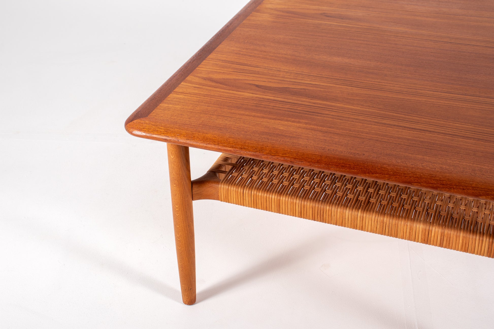 Detail of rounded teak edges on Danish coffee table