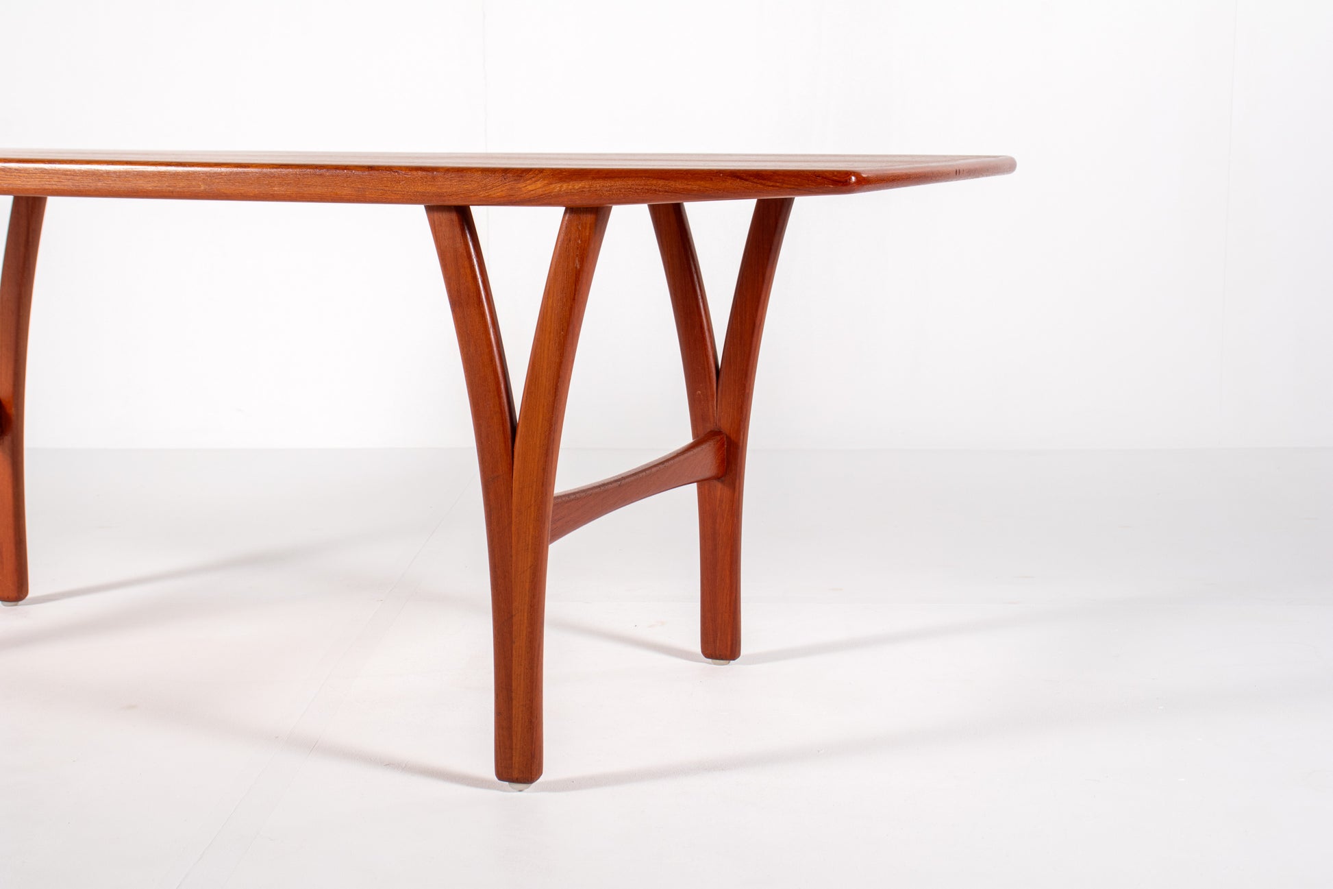 Side view of large mid-century modern teak coffee table