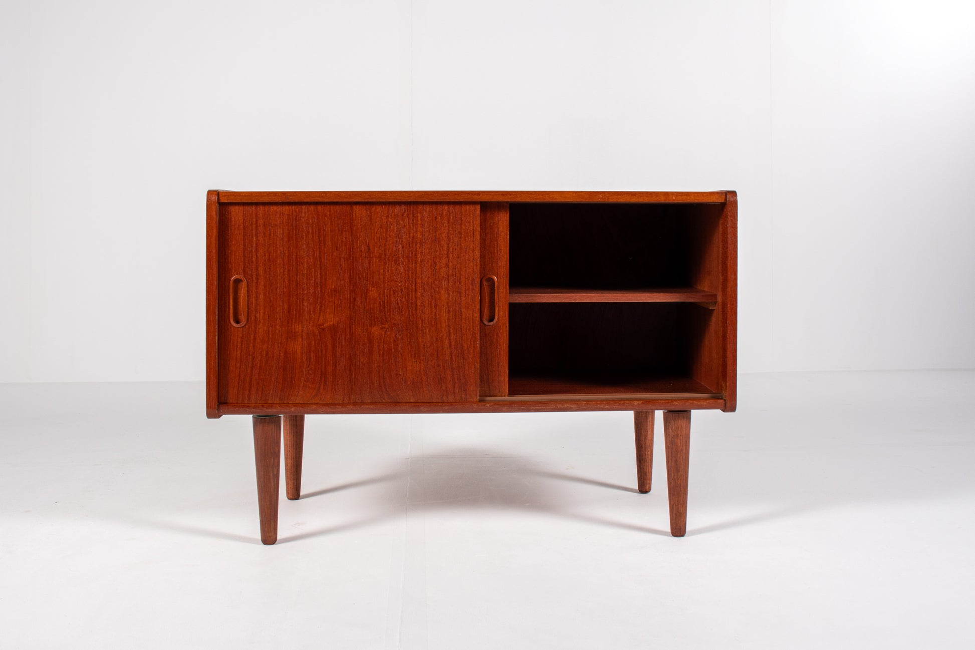 Interior shelving of mid-century modern teak cabinet