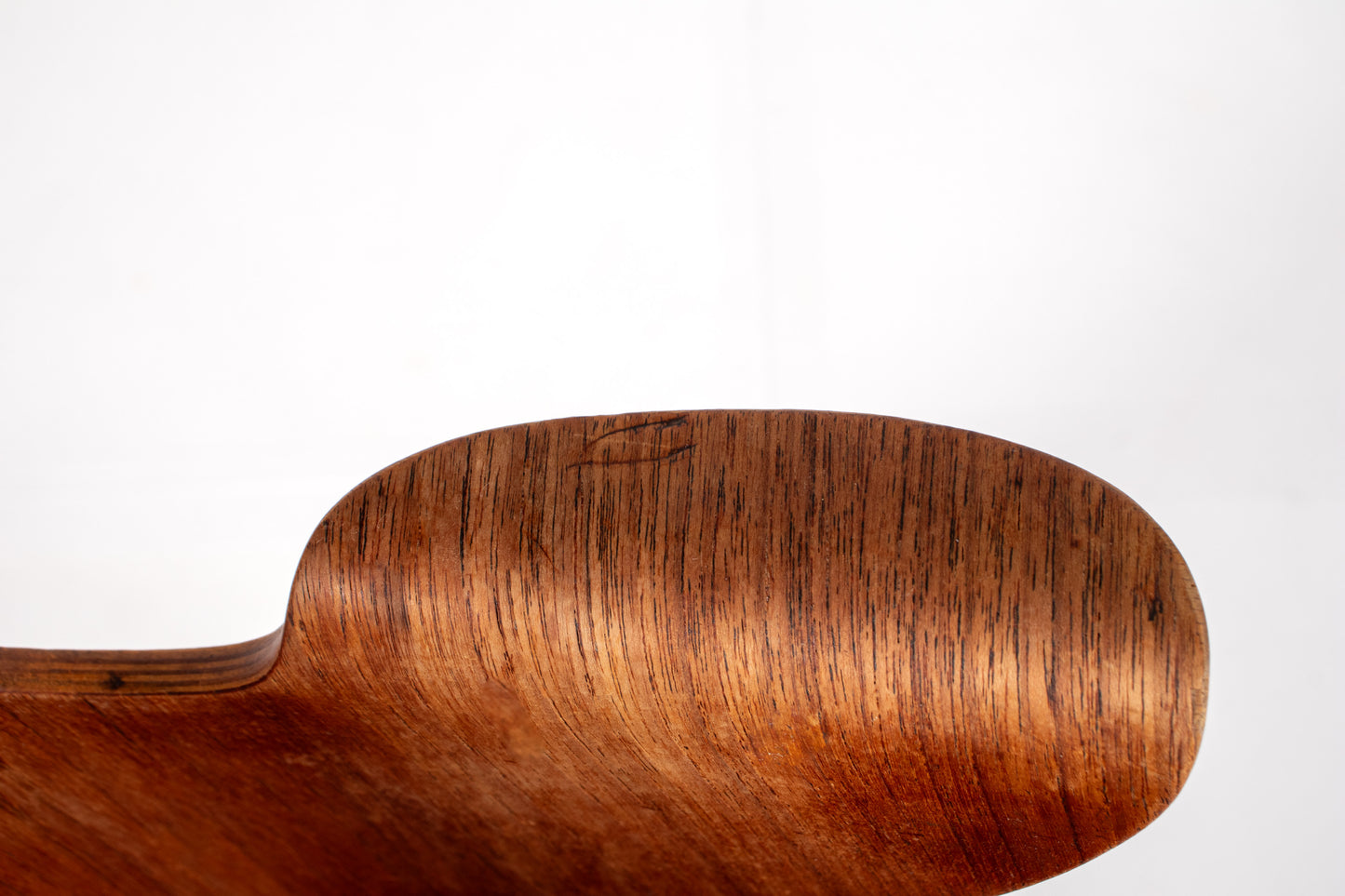 Detail of wood grain on Hans Olsen Model 107 armchair