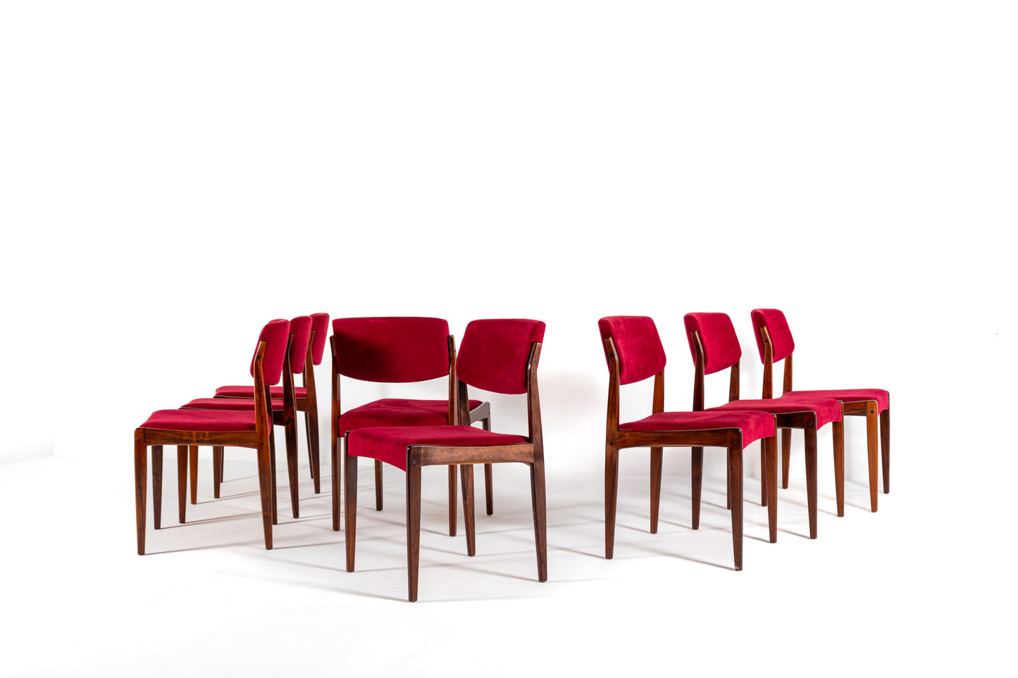 Danish mid-century dining chairs upholstered in red velvet