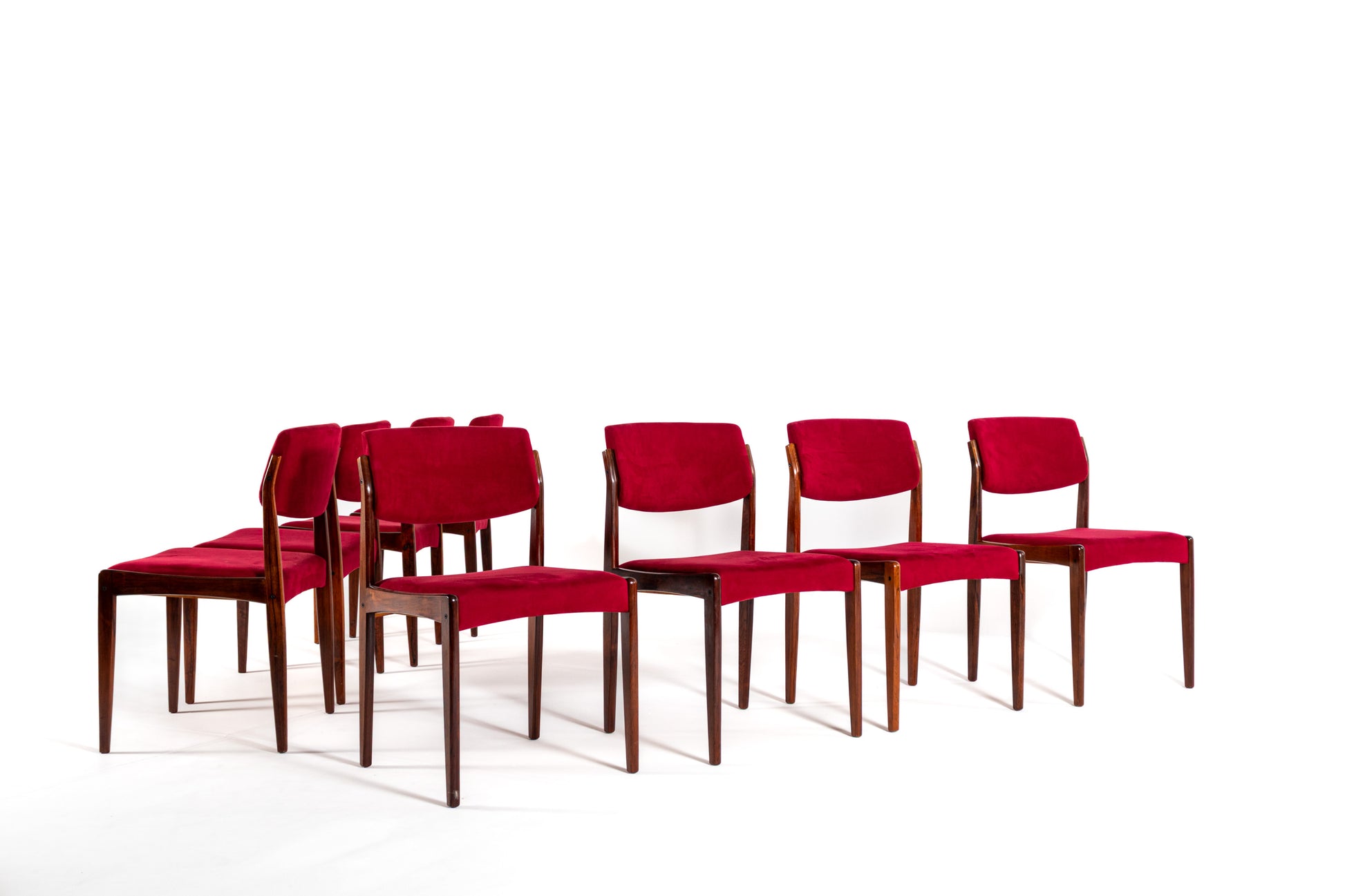 Danish mid-century dining chairs upholstered in red velvet