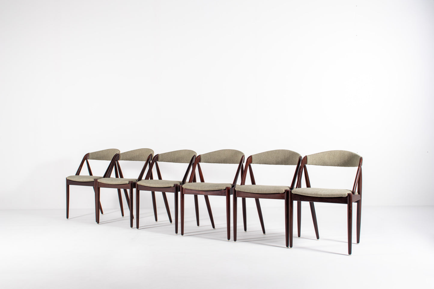 Set of six Kai Kristiansen Model 31 Danish mid-century dining chairs in teak with upholstered seats