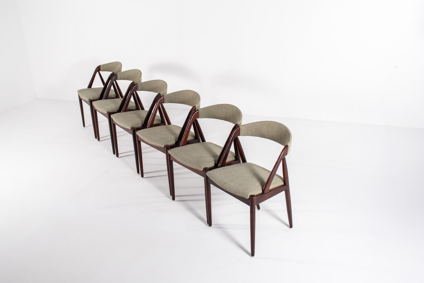 Set of six Kai Kristiansen Model 31 Danish mid-century dining chairs in teak with upholstered seats