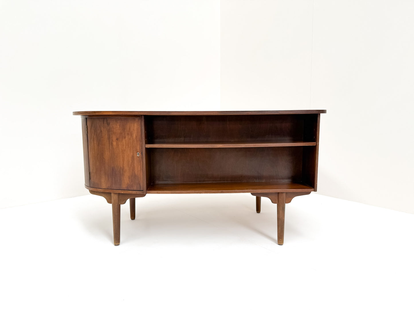 Sculptural curved walnut desk mid-century design bookshelf back