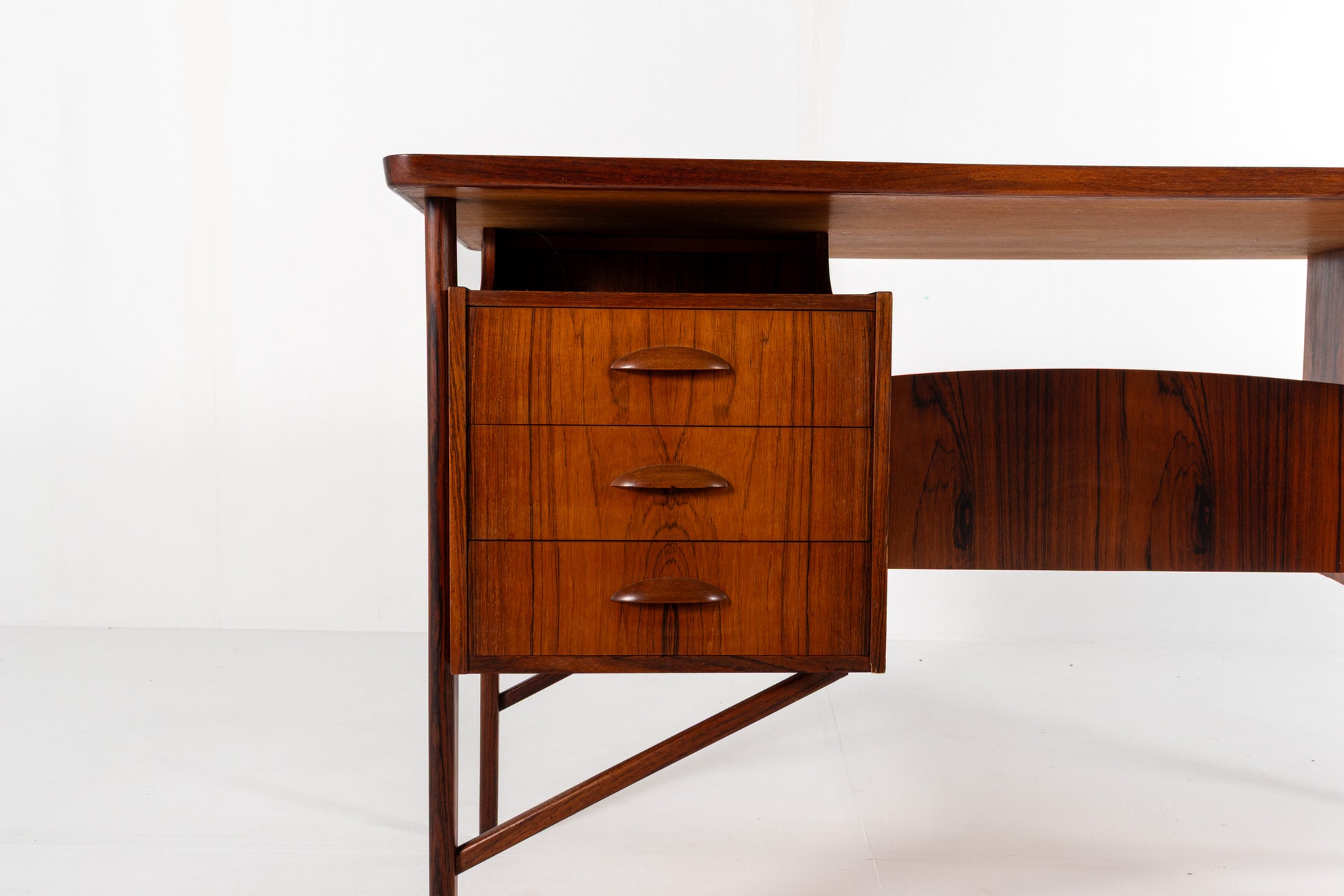 Rosewood desk with sculpted drawer handles
