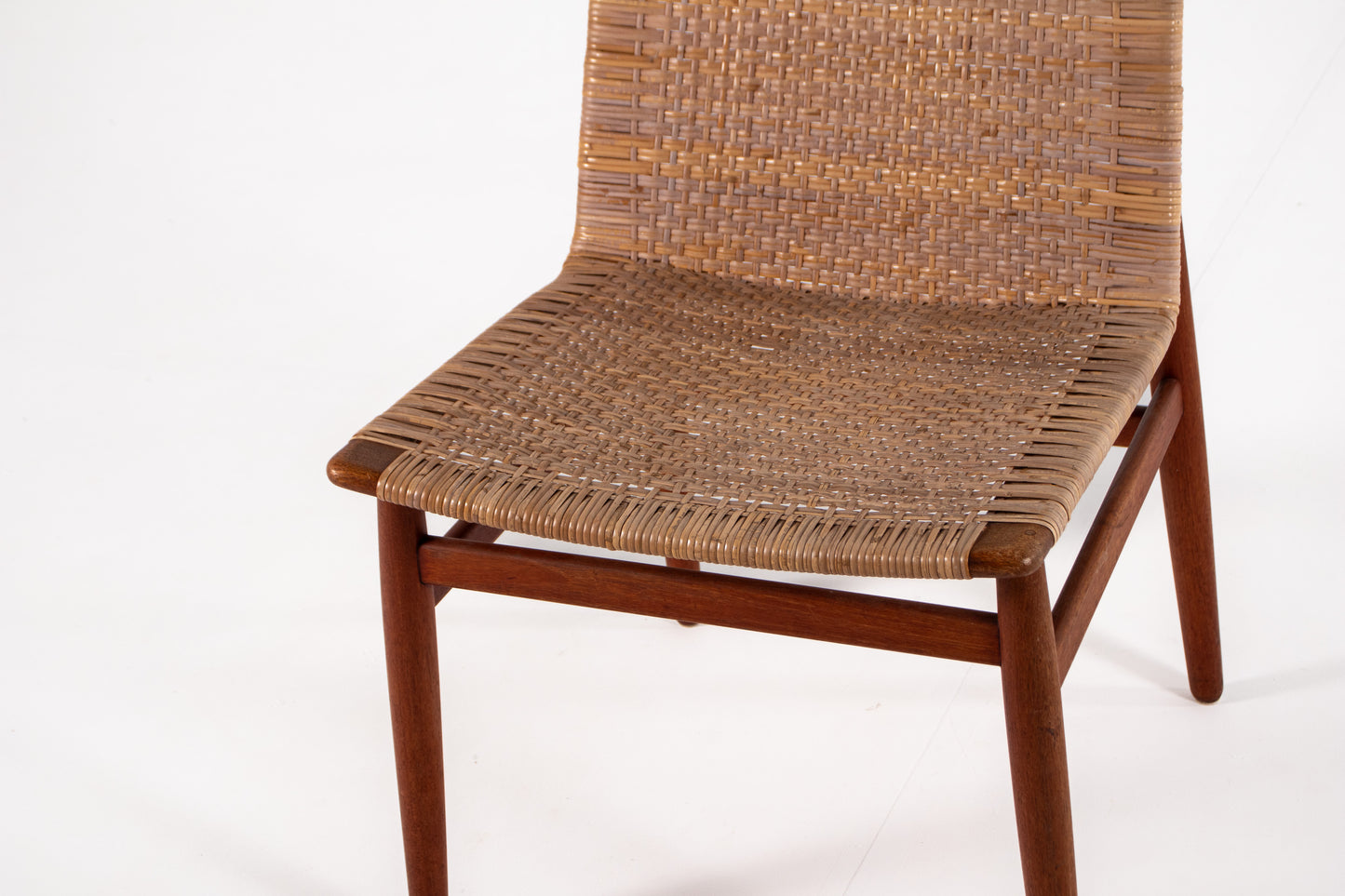 Scandinavian teak chair with woven rattan seat