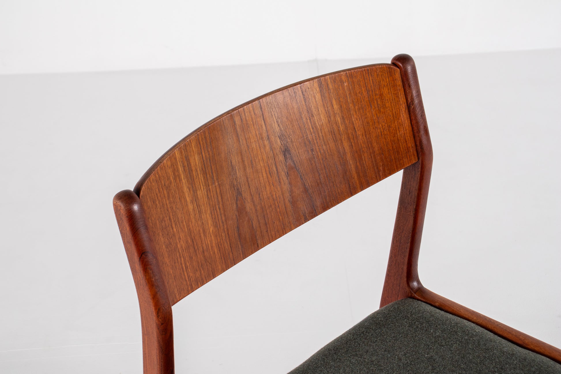 Danish modern dining chairs with curved backs