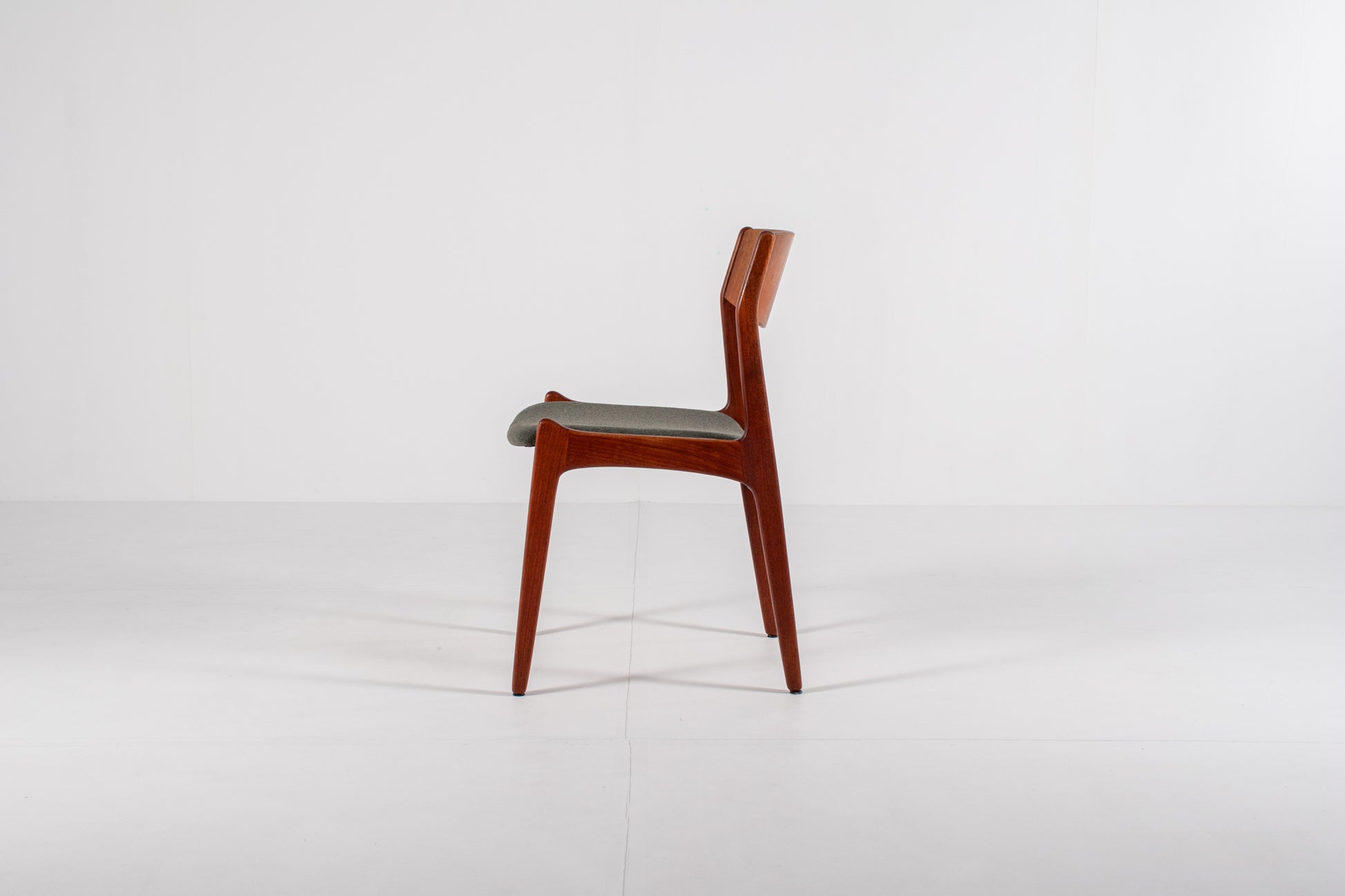 Danish modern dining chairs with curved backs side view
