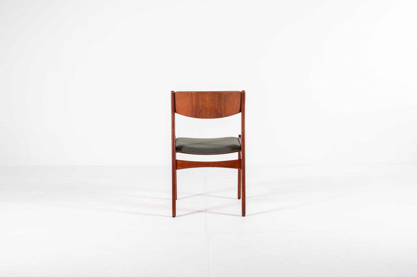 Danish modern dining chairs with curved backs back view