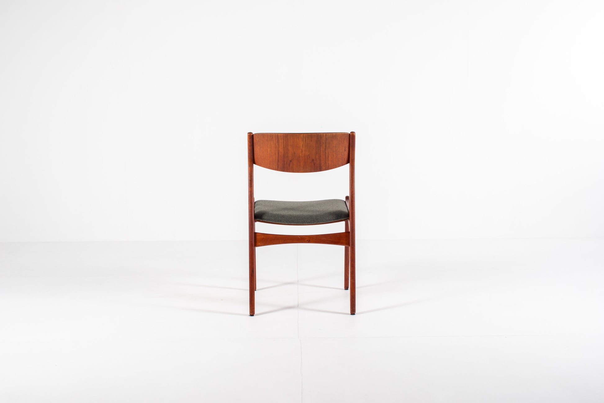Danish modern dining chairs with curved backs back view