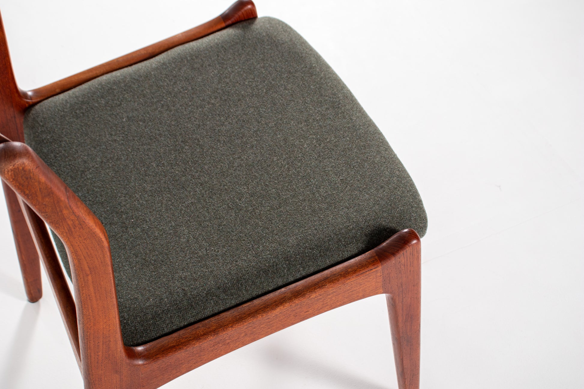 Vintage teak dining chairs with green upholstery