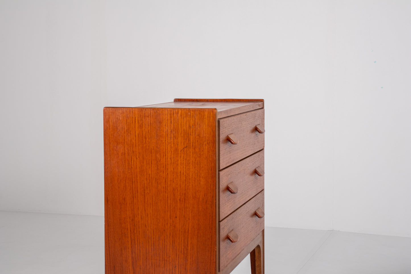Compact Danish modern teak storage cabinet