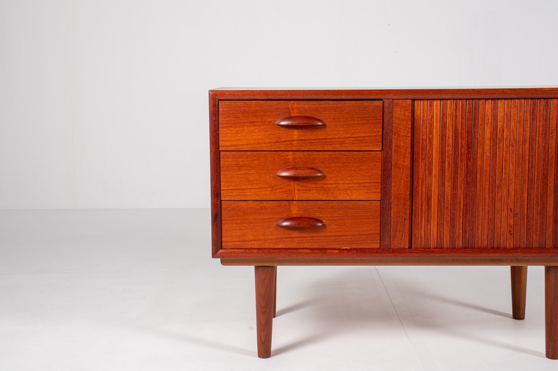 Teak sideboard with sculpted oval handles