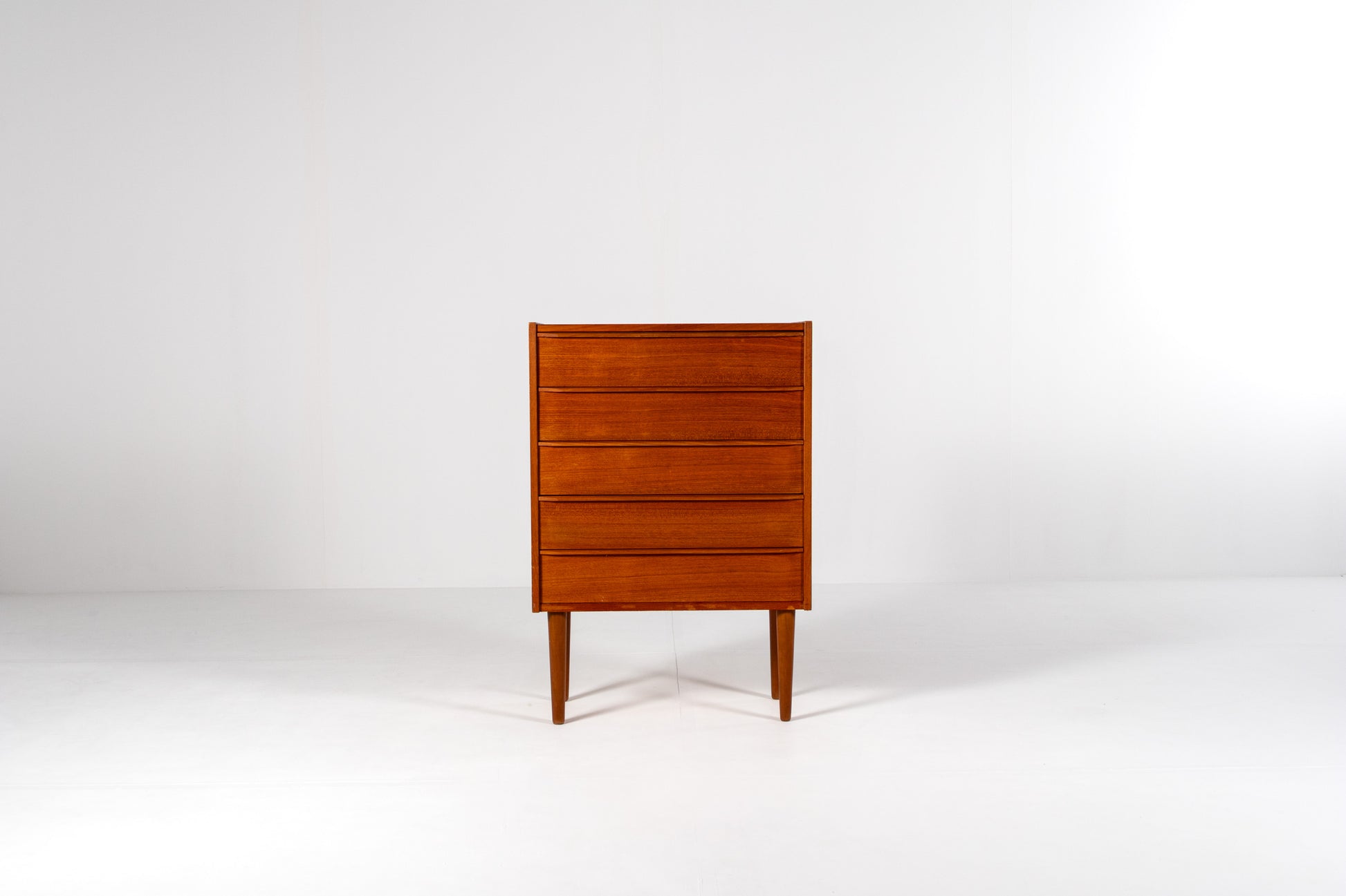Vintage Danish tallboy dresser in teak