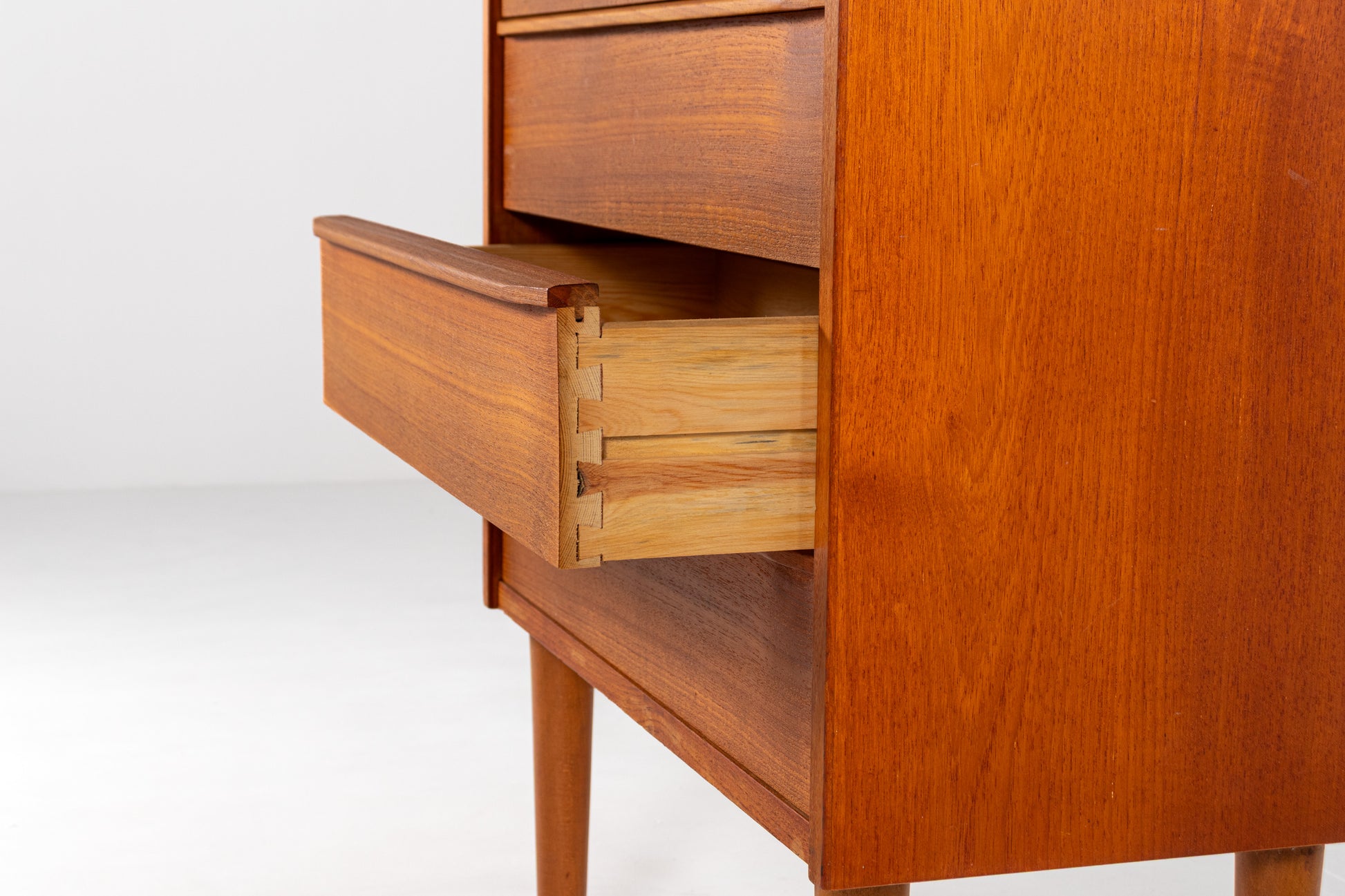 Drawer detail with dovetail joints teak dresser