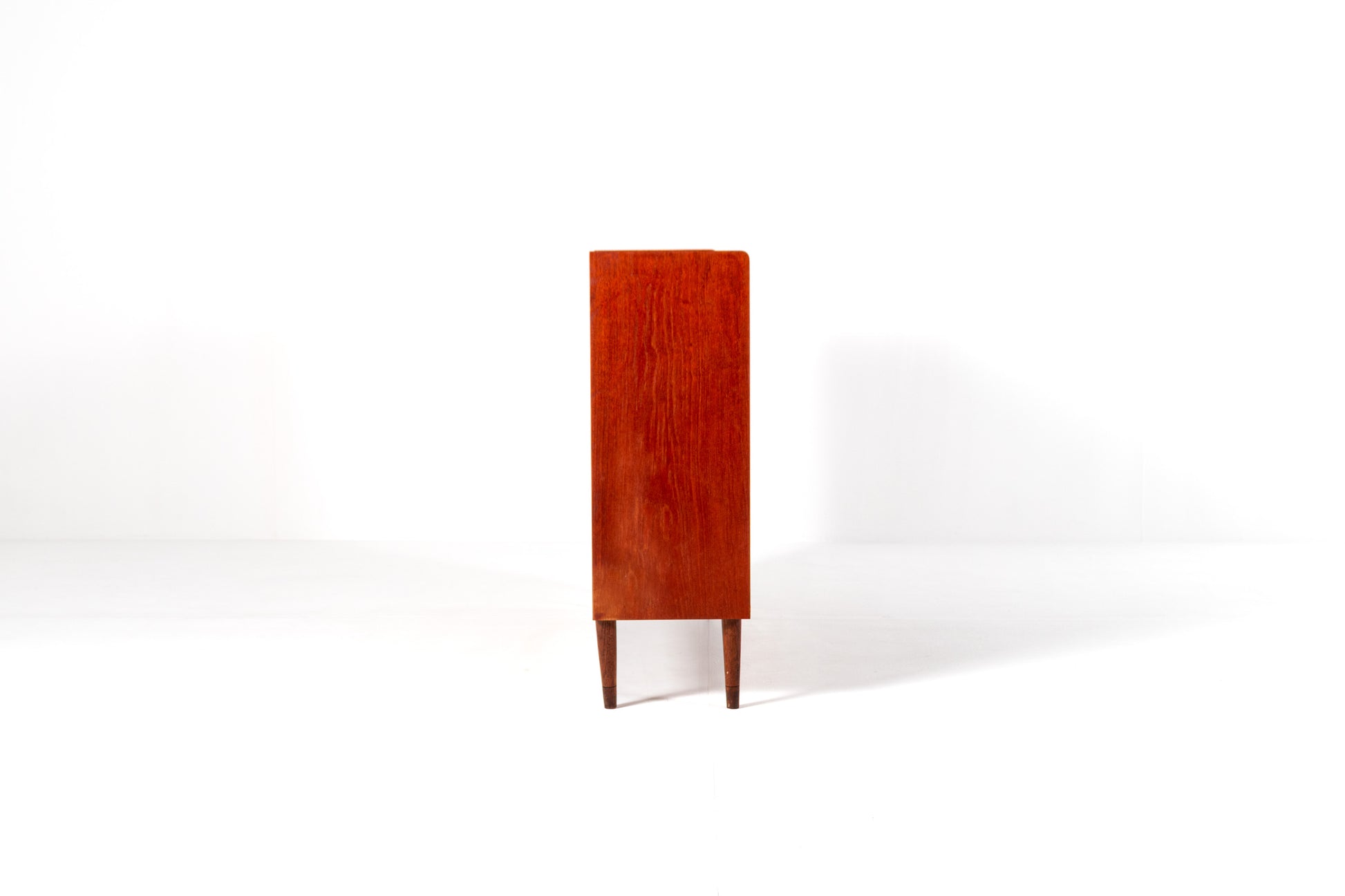 Mid century teak cabinet open shelves drawers side view
