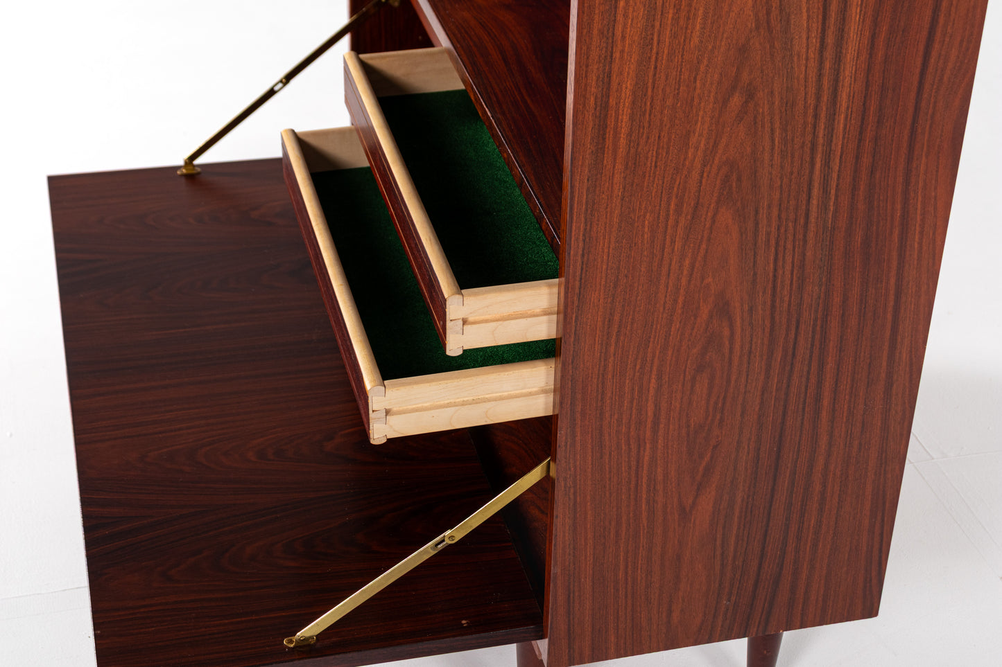 Drop down cabinet interior compartments