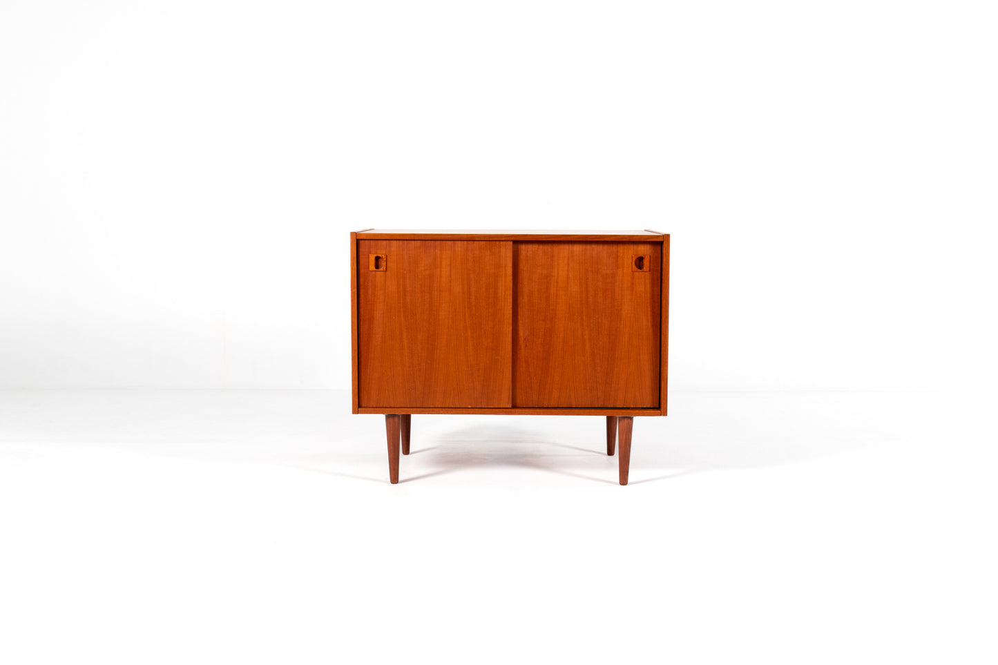 Swedish teak cabinet 1960s sliding doors front view
