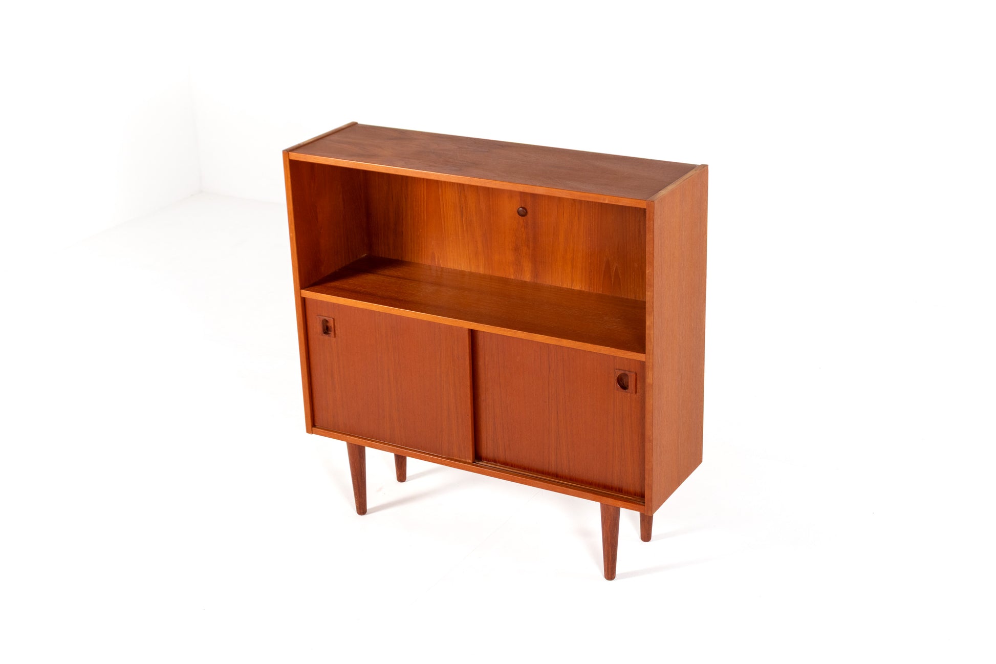 Scandinavian teak cabinet on tapered legs