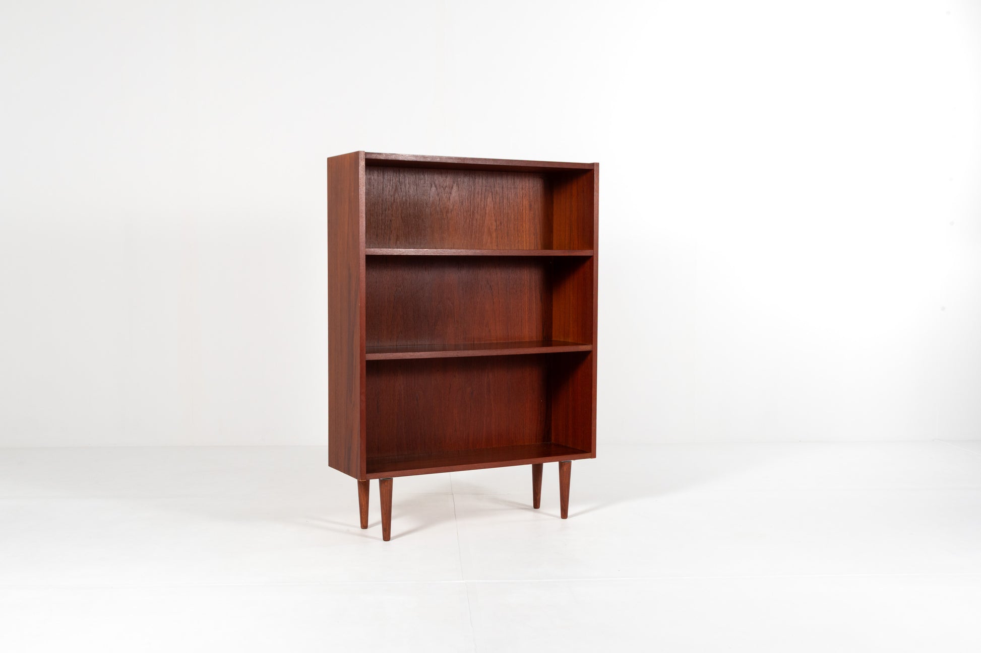 Scandinavian teak cabinet on tapered legs
