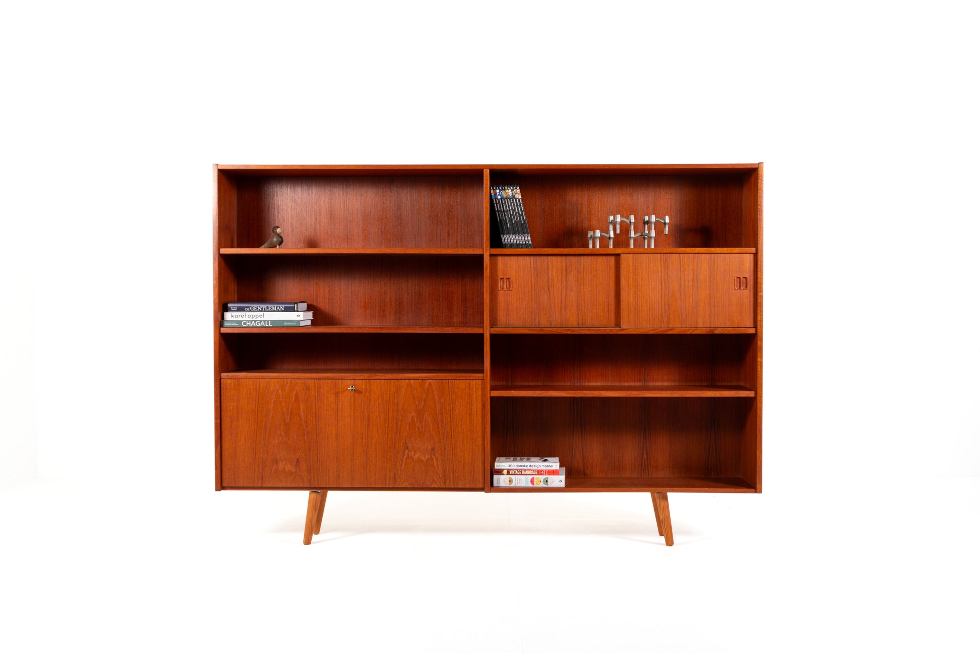Danish Mid-Century teak bookcase with sliding doors from the 1960s