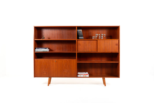 Danish Mid-Century teak bookcase with sliding doors from the 1960s