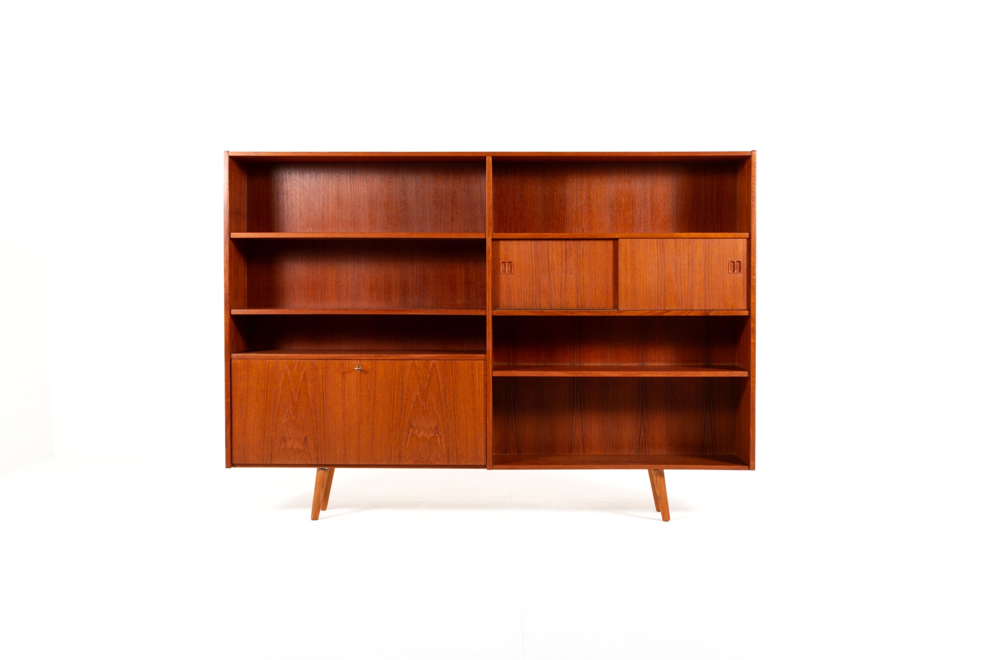 Danish Mid-Century teak bookcase with sliding doors from the 1960s