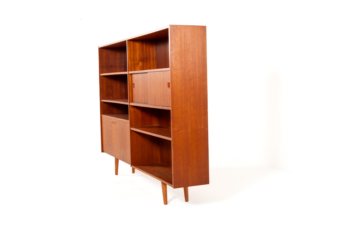 Danish Mid-Century teak bookcase with sliding doors from the 1960s