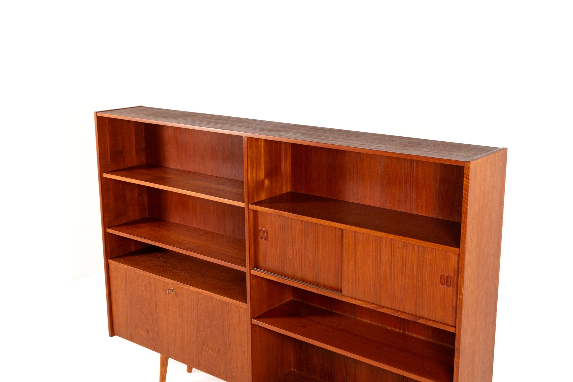 Danish Mid-Century teak bookcase with sliding doors from the 1960s
