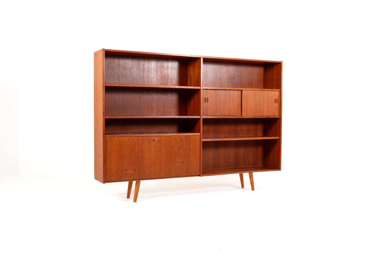 Danish Mid-Century teak bookcase with sliding doors from the 1960s