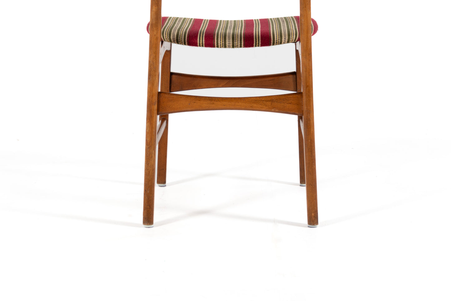 Vintage Danish dining chairs with curved teak backrests.