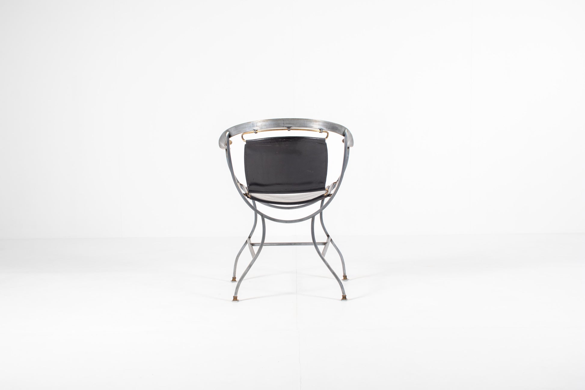 A mid-century modern metal Armchair Alberto Orlandi Pompei  in Steel, Bronze and Black Leather, back view