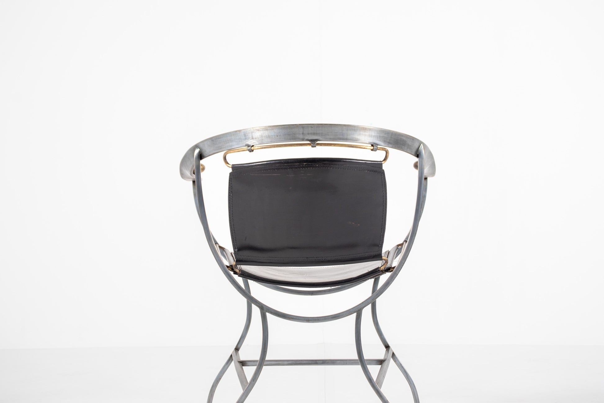 A mid-century modern metal chair Alberto Orlandi Pompei  in Steel, Bronze and Black Leather 