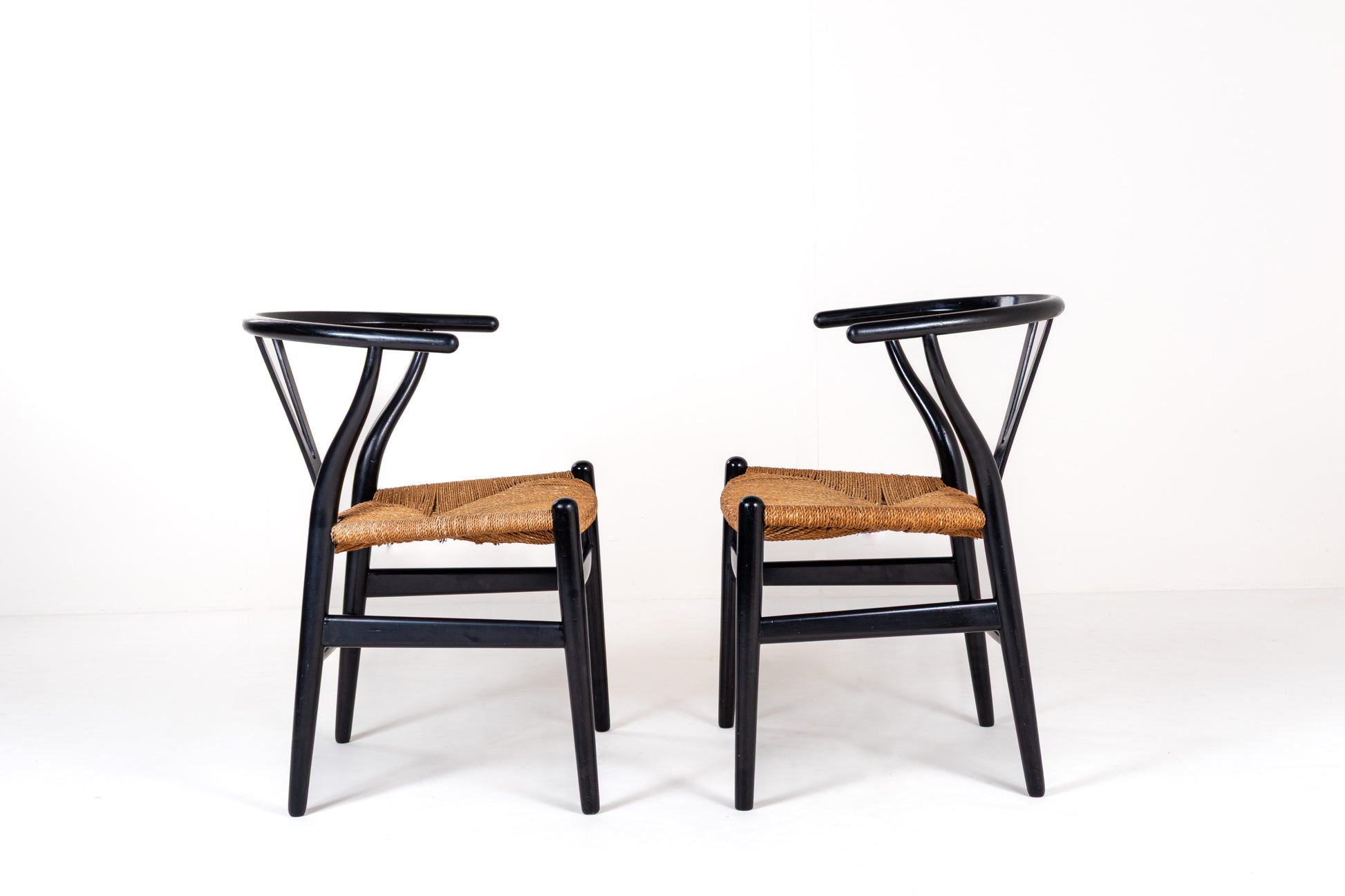 CH24 Wishbone Chairs, black lacquered frame