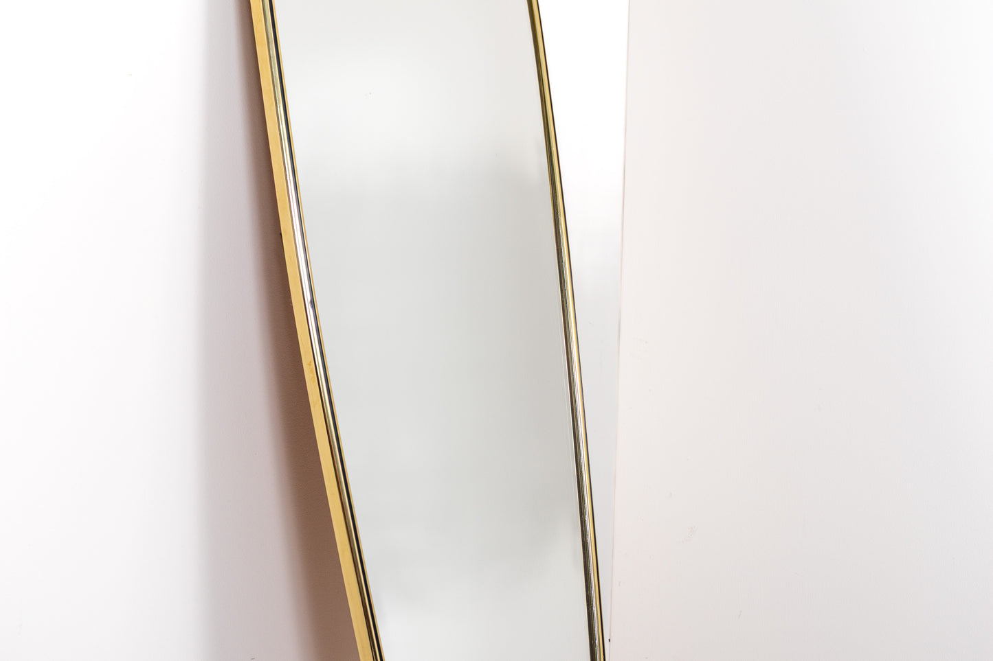 Mid-century brass wall mirror with organic frame, 1960s
