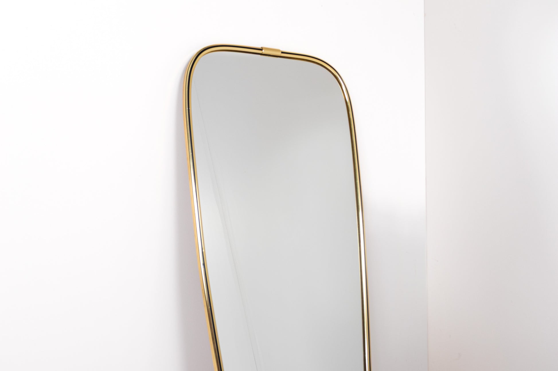 Mid-century brass wall mirror with organic frame, 1960s