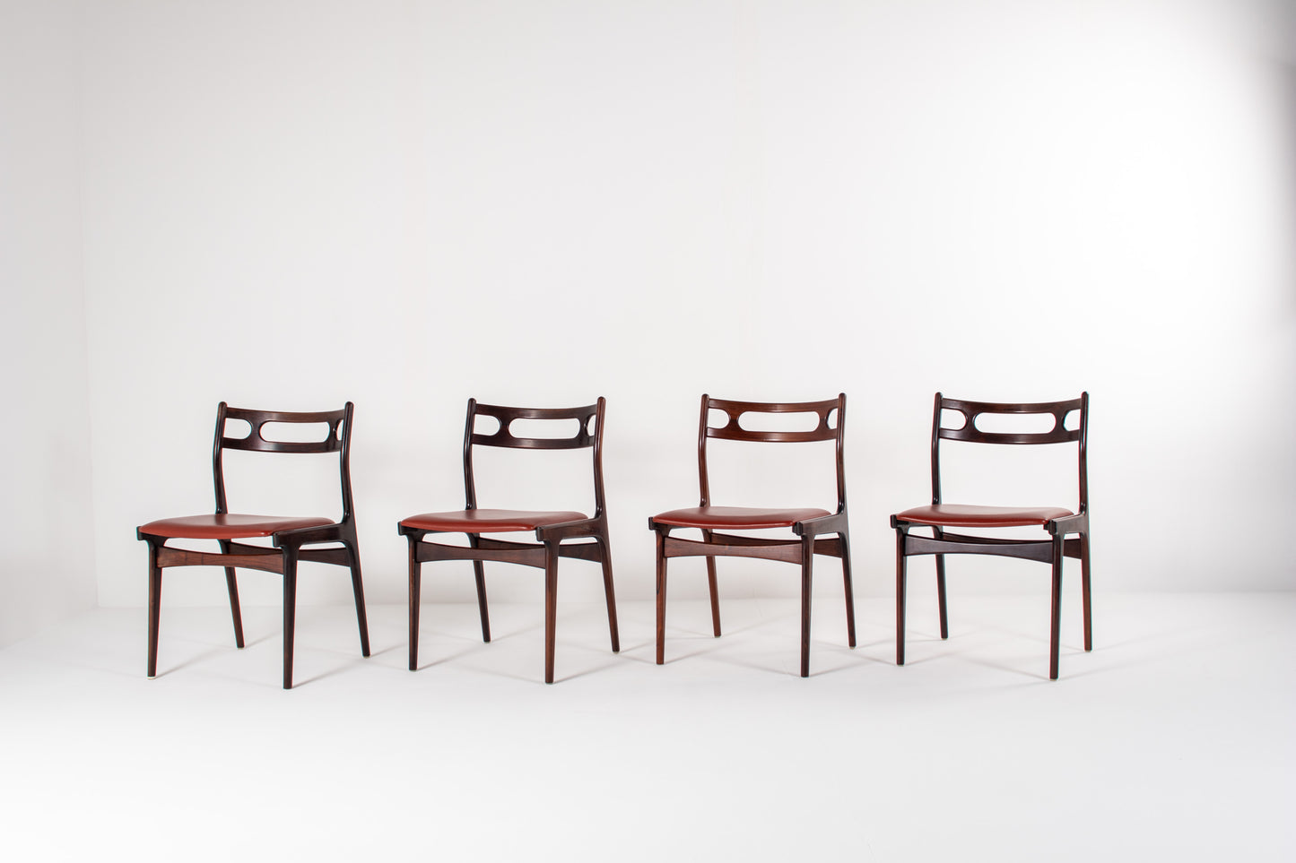 Vintage rosewood dining chairs by Johannes Andersen, Model 138