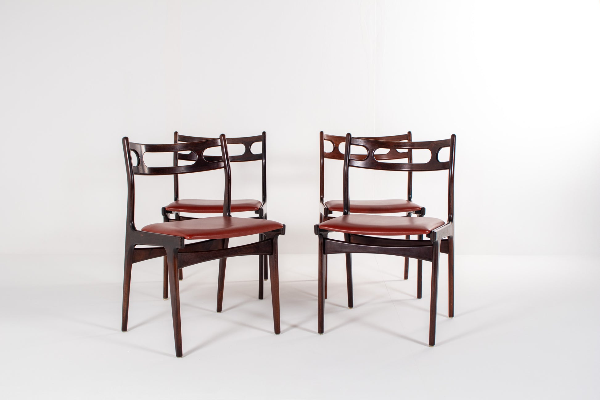 Mid-century Danish dining chairs with red leather seats, set of four