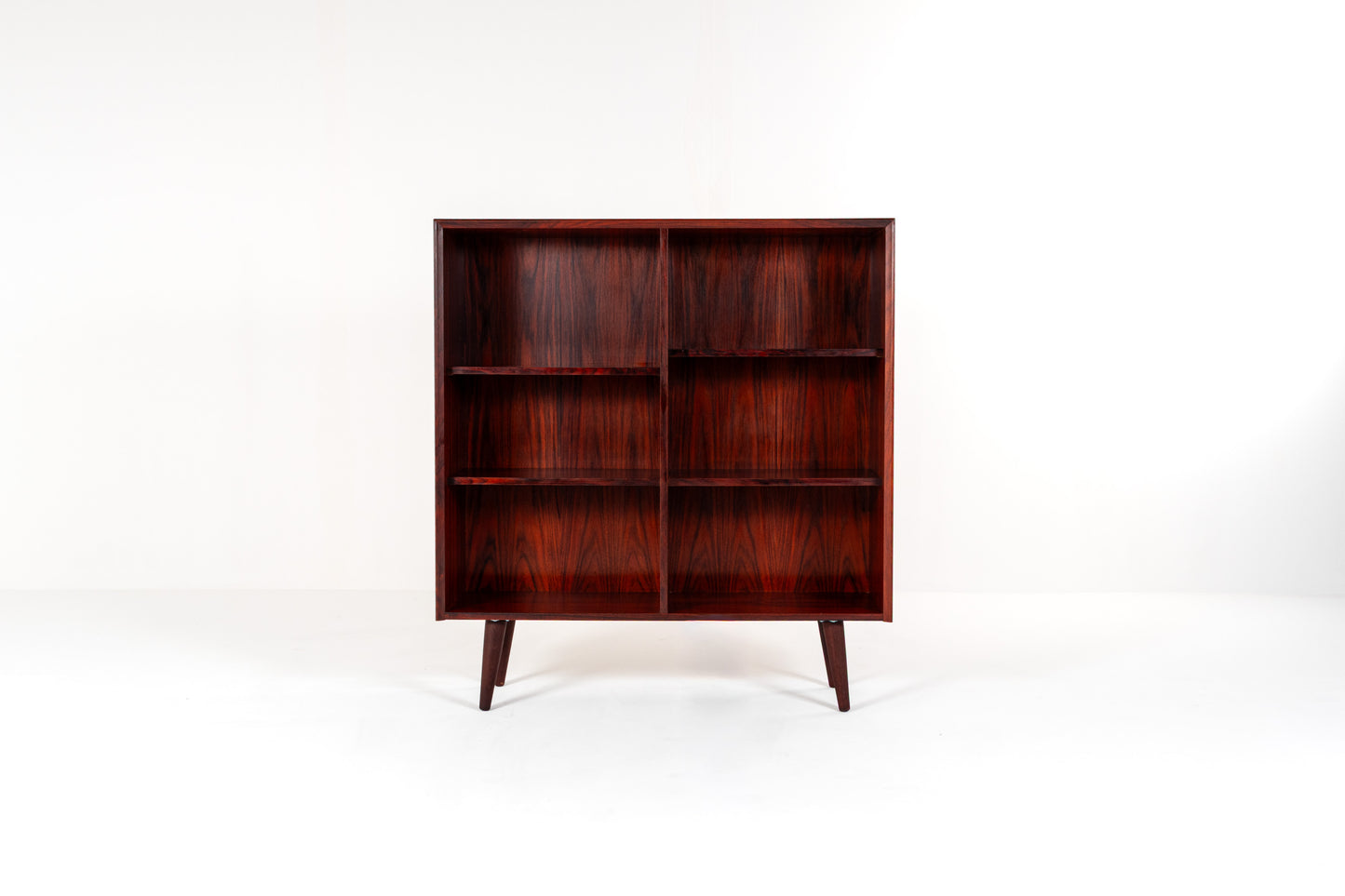 1960s Scandinavian rosewood bookcase on tapered legs